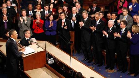 President Barack Obama is applauded on Capitol Hill in Washington, Tuesday, Jan. 25, 2011, prior to delivering his State of the Union address in Washington, Tuesday, Jan. 25, 2011. (AP Photo/Evan Vucci)