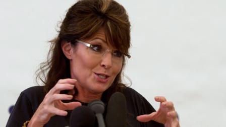 Former Alaska Gov. Sarah Palin talks to the press at the Titanyan Global Outreach Samaritans Purse compound in Cabaret, Haiti, Sunday Dec. 12, 2010. Palin is in Haiti as part of a brief humanitarian mission in the impoverished nation struggling to overcome post-election violence and a cholera epidemic. (AP Photo/Guillermo Arias)