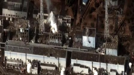 The satellite image confirms damage to the Units 1, 3, and 4 reactor buildings.
