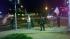 A small crowd forms at Blackstone and Shaw in...