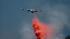 Air tanker drops fire retardant. Taken from...
