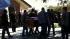 His casket was taken in a procession through the...