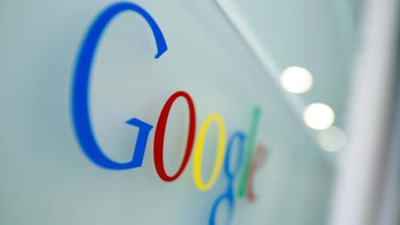FILE - This Oct. 1, 2011 file photo, shows the Google logo at the Google headquarters in Brussels. Google is sifting through the photos and commentary on its blossoming social network so its Internet search results can include more personal information.