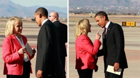 Arizona Gov. Jan Brewer points at President Barack Obama after he arrived at Phoenix-Mesa Gateway Airport