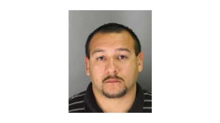Paul Corona III, 25 of Porterville, was arrested on Wednesday after a report that a cell phone was found with explicit images of a student and a Strathmore High School staff member.