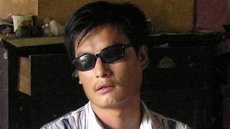 In this undated file photo provided by supporters of Chen Guangcheng, blind activist Chen Guangcheng sits in a village in China. Assistant Secretary of State Kurt Campbell, who arrived early Sunday, April 29, 2012, in Beijing