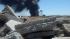 The fire is burning a pile of carpets at a...
