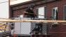 Police break out a window of an apartment where the suspect in a shooting at a movie theatre lived in Aurora, Colo., Friday, July 20, 2012.