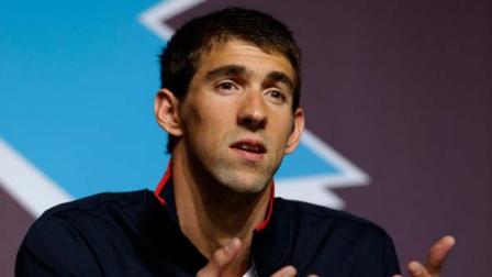 U.S. swimmer Michael Phelps speaks at a press conference held at the media center of the 2012 Summer Olympics