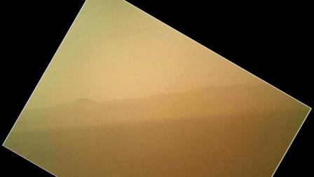 The first color view of the north wall and rim of Gale Crater where NASAs rover Curiosity landed Sunday night.