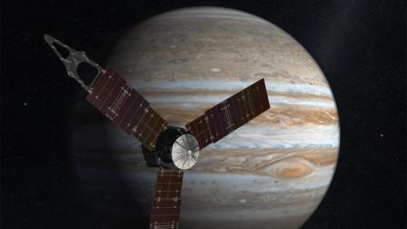 Juno spacecraft circling Jupiter.