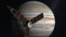 Juno spacecraft circling Jupiter.