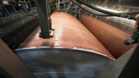 the beef product known as pink slime or lean finely textured beef is frozen on a large drum