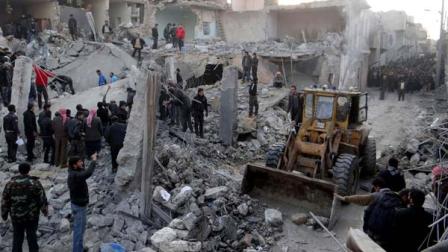 people gather around destroyed buildings after airstrikes hit areas in Aleppo, Syria.