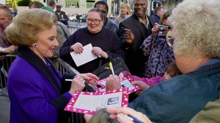 Dear Abby advice columnist Pauline Phillips, 82, known to millions of readers as Abigail van Buren, signs autographs for some of dozens of fans after the dedication of a Dear Abby star on the Hollywood Walk of Fame