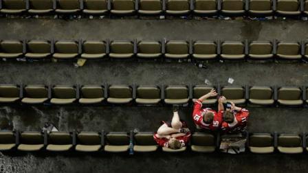 San Francisco 49ers fan remain in the stands after the Baltimore Ravens won the NFL Super Bowl XLVII football game 34-31, Sunday, Feb. 3, 2013, in New Orleans.