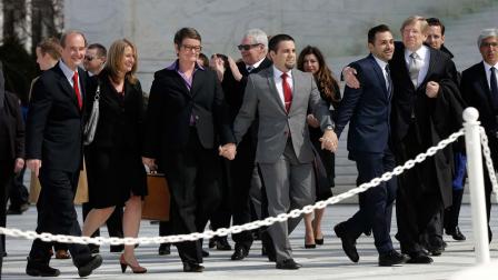 From left, attorney David Boies, plaintiffs, Sandy Stier, with partner Kris Perry, from Berkeley, Calif., Jeff Zarrillo, with partner Paul Katami from Burbank, Calif., and their attorney Theodore Olson leave the Supreme Court in Washington