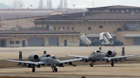 U.S. Air Force A-10 attack aircrafts wait to take off on the runway during their military exercise at the Osan U.S. Air Base in Pyeongtaek, south of Seoul, South Korea