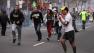 In this photo provided by The Daily Free Press and Kenshin Okubo, people react to an explosion at the 2013 Boston Marathon in Boston, Monday, April 15, 2013. (AP Photo/The Daily Free Press, Kenshin Okubo)