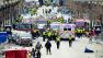 Police clear the area at the finish line of the 2013 Boston Marathon as medical workers help injured following explosions in Boston, Monday, April 15, 2013.