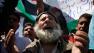 A Syrian refugee chants anti-Bashar Assad slogans during a strike at Zaatari refugee camp, in Mafraq, Jordan