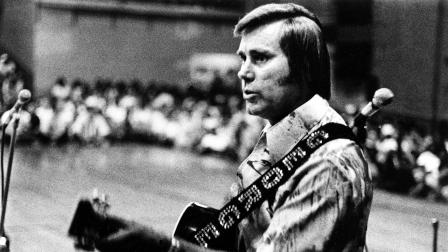 Country singer George Jones is shown performing with his guitar in this undated photo.