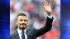 Englands David Beckham gestures during a ceremony to honor the five players that have played for England over 100 times each during the international friendly soccer match between England and Belgium at Wembley Stadium in London.
