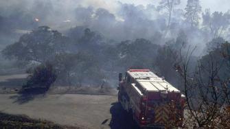  Wildfire engulfs a house in Yosemite Lakes. Homeowner, his wife and kids are out safe.