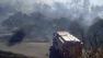  Wildfire engulfs a house in Yosemite Lakes. Homeowner, his wife and kids are out safe.