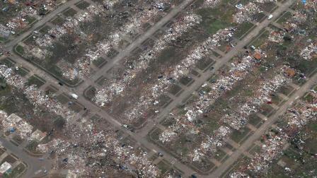 An aerial view of an entire neighborhood destroyed by Mondays tornado is shown Tuesday, May 21, 2013, in Moore, Okla.