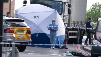 A tent is erected near the scene of an attack in Woolwich southeast London Wednesday, May, 22, 2013.