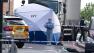 A tent is erected near the scene of an attack in Woolwich southeast London Wednesday, May, 22, 2013.