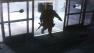 A surveillance photo shows the suspected gunman entering the Santa Monica College library on Friday, June 7, 2013.