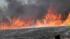 An abandoned golf course fire in East Central Fresno threatened the Palm Lakes apartment complex.