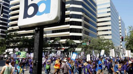 In this file photo from Monday, July 1, 2013, striking Bay Area Rapid Transit workers picket as they close the intersection of 14th and Broadway on Monday, July 1, 2013,