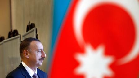Azerbaijan President Ilham Aliyev leaves a polling station after casting his ballot in Baku, Azerbaijan, Wednesday, Oct. 9, 2013.