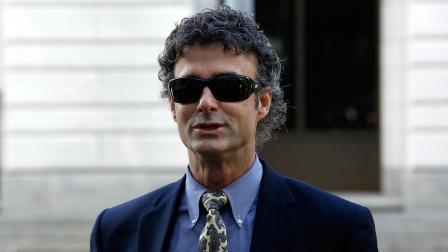 Kurt Mix arrives at the Hale Boggs Federal Building in New Orleans, Tuesday, Dec. 3, 2013. The former BP engineer faces criminal charges alleging he deleted emails after being ordered to preserve them during the investigation of the BP oil spill.