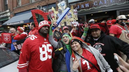 Fans cheer before the NFL football NFC Championship game between the Seattle Seahawks and the San Francisco 49ers Sunday, Jan. 19, 2014, in Seattle. (AP Photo/Marcio Jose Sanchez)