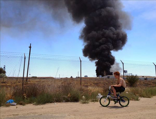 Fire burns a pile of carpets in south of...
