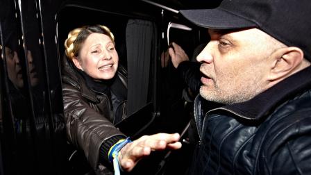 Former Ukrainian Prime Minister Yulia Tymoshenko is greeted by supporters shortly after being freed from prison in Kharkiv, Ukraine, Saturday, Feb. 22, 2014. Tymoshenko said she will run for president in May.
