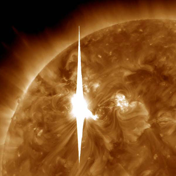 This handout image provided by NASA shows a solar flare heading toward Earth. An impressive solar flare is heading toward Earth and could disrupt power grids, GPS and airplane flights