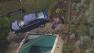 Some amazing work by a crane operator helped remove a car from the backyard.