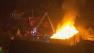 Large flames could be seen shooting from the roof of a building in Berkeley at Alcatraz Avenue and King Street after 11 p.m. Monday.