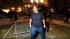An Occupy Oakland protester shouts after tearing...