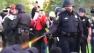 Video posted on YouTube shows UC Davis police pepper spraying protesters. (Courtesy Stephen McKone/Aggie TV)