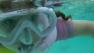 A video that quickly became a viral sensation shows a couples 5-year-old daughter snorkeling with sharks.