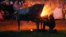 Mauro Ffortissimo plays baby grand piano set on fire in Half Moon Bay.