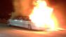 This frame grab taken from video provided by Roxana and Carlos Guzman shows a Limo on fire Saturday, May 4, 2013, on the San Mateo-Hayward Bridge in San Francisco.