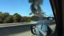 A brush fire was burning along southbound Highway 101 in Brisbane Wednesday afternoon.