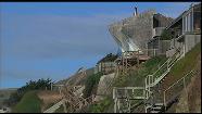 A home that has been red-tagged due to coastal erosion.